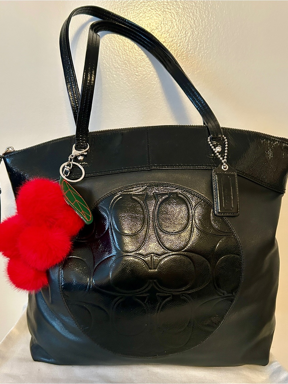 COACH Laura Tote. Leather Shoulder Bag with Red Pom Cherries Bag Charm